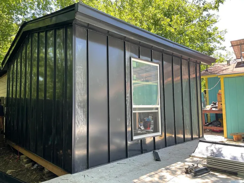 Black standing seam metal wall panels for Roof Inspection in Payson